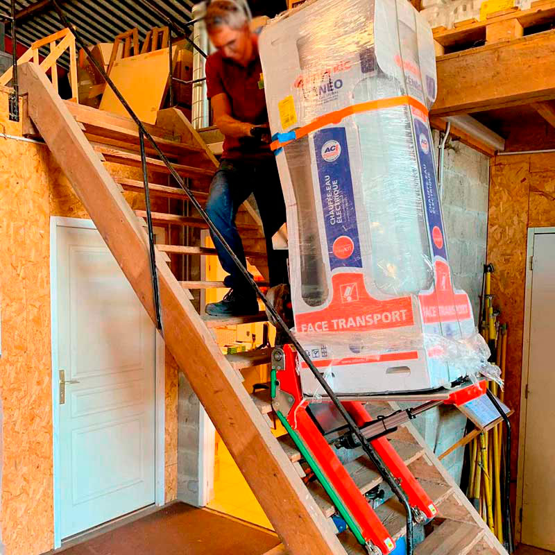 Electric stair climber for wood stove delivery to apartment
