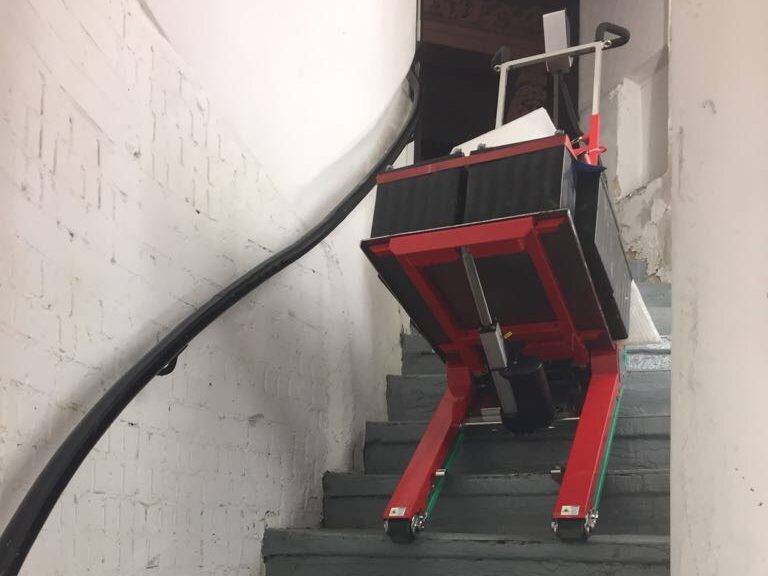 Electric stair climber for UPS transport to server room
