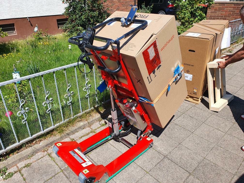 Electric stair climbing trolley for boiler transport on stairs