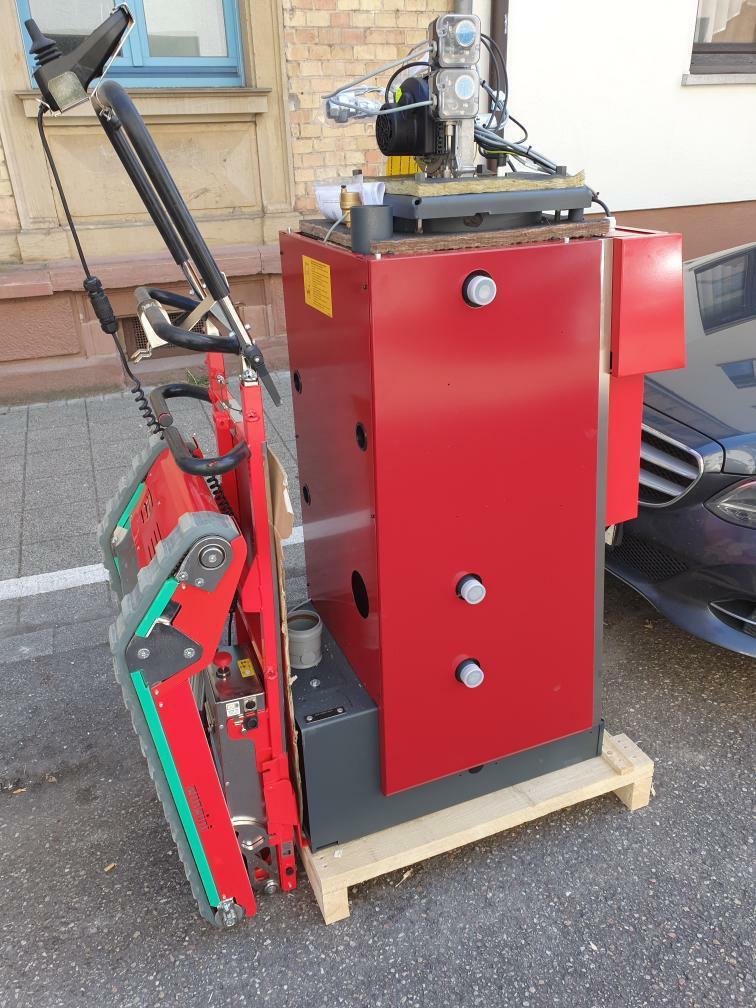 Stair climbing trolley for condensing boiler transport in apartment building