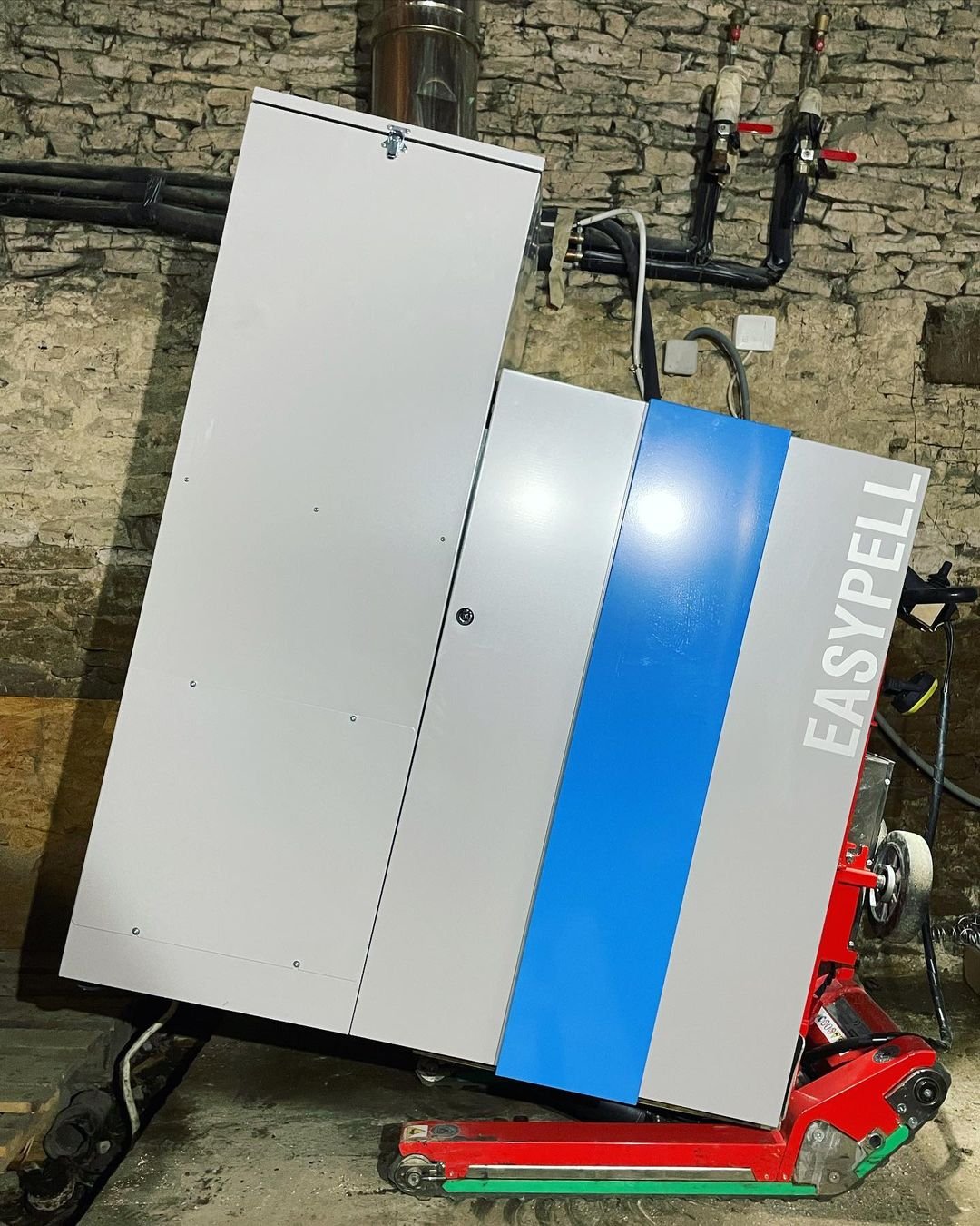 Condensing boiler transport on stairs with stair climber