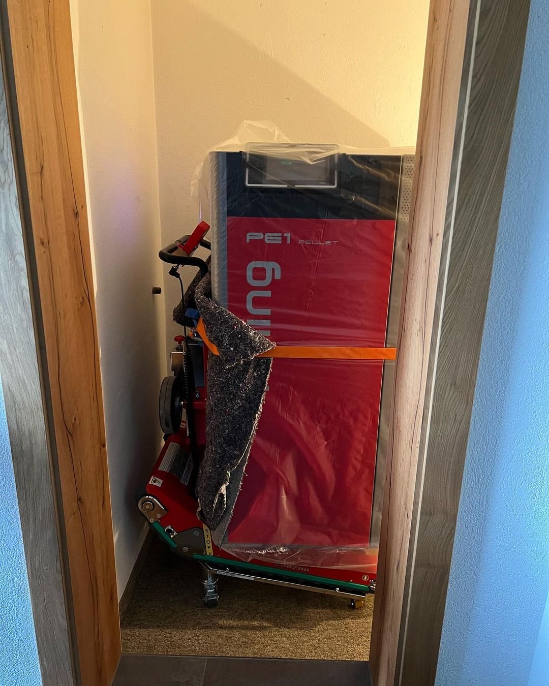 Water heater transport on stairs in apartment building