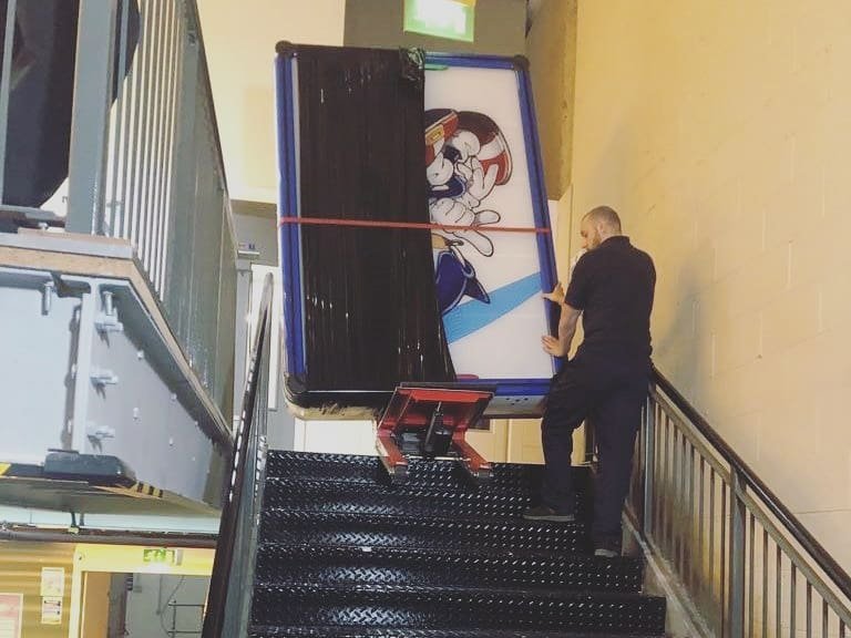 Stair climbing dolly for foosball table transport