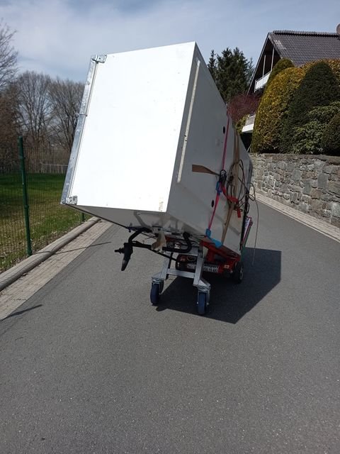 Electric stair climber for industrial appliance transport on ramp