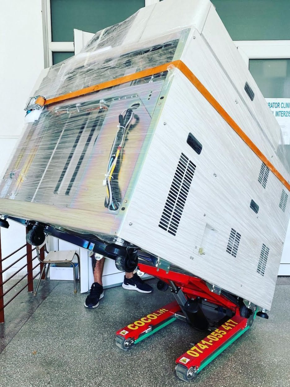 Electric stair climbing dolly for commercial dishwasher transport in restaurant