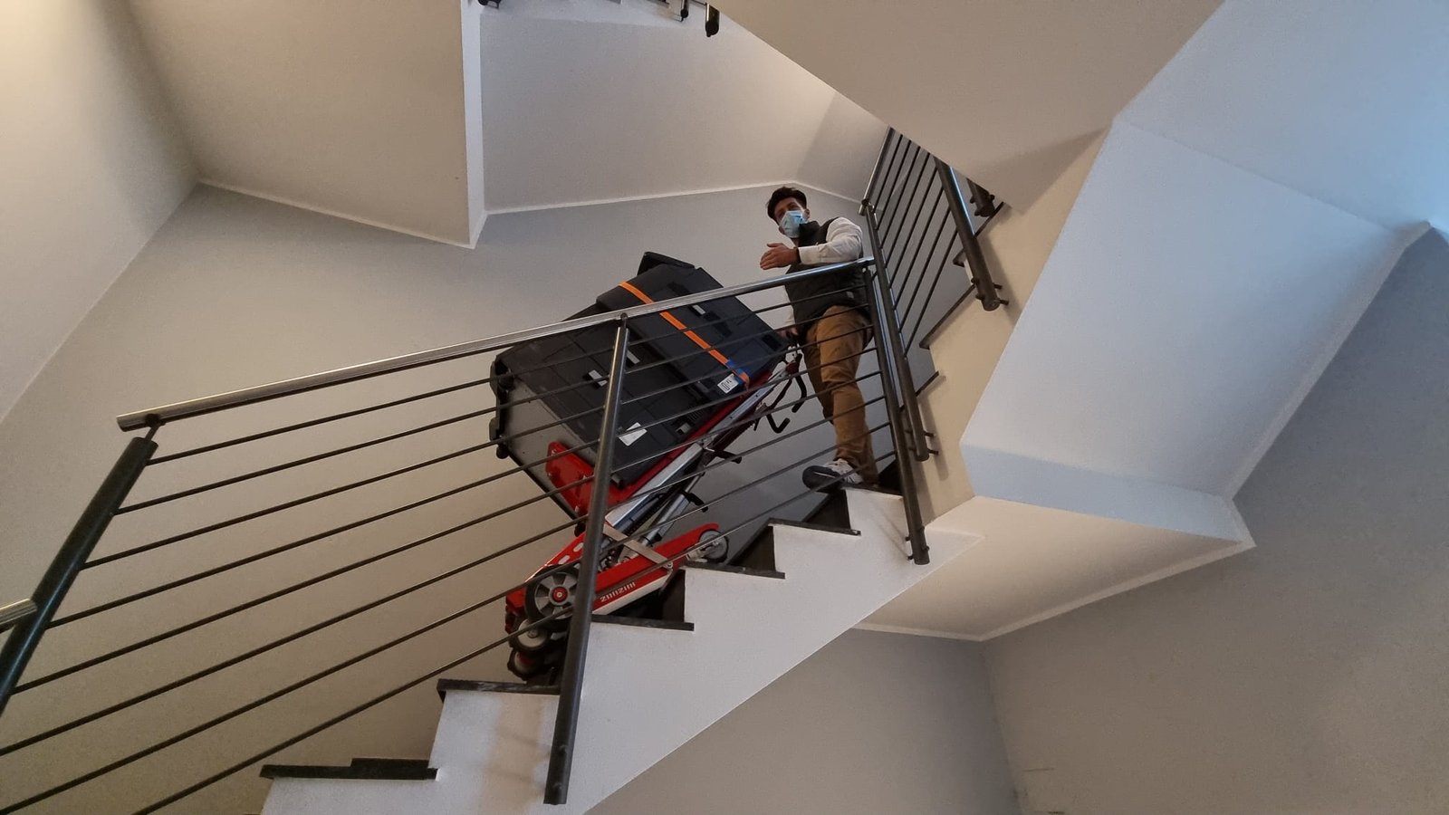 Large format plotter and printer transport with stair climber