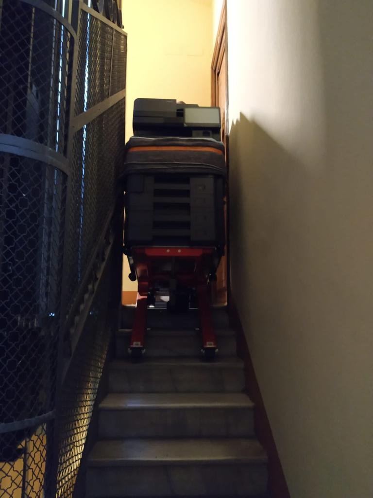 Multifunction printer transport with electric stair climber