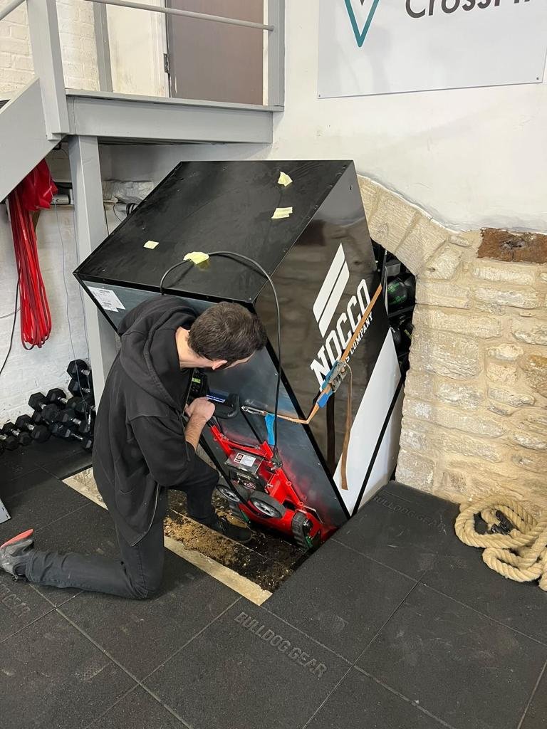 Electric stair climber for water dispenser transport to upper floors