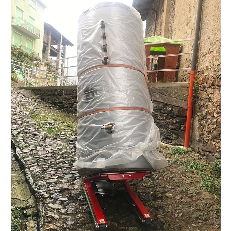 Transporte de unidad exterior de aire acondicionado con sube escaleras